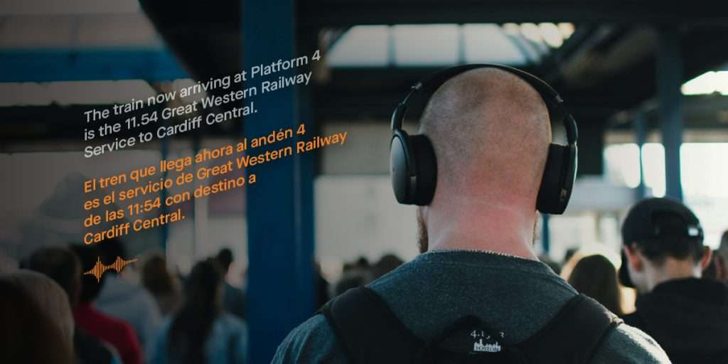 Man wearing headphones at Bristol Temple Meads Station
