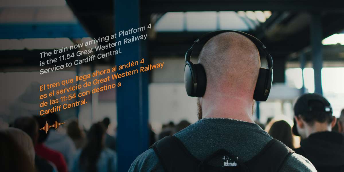 Man wearing headphones at Bristol Temple Meads Station